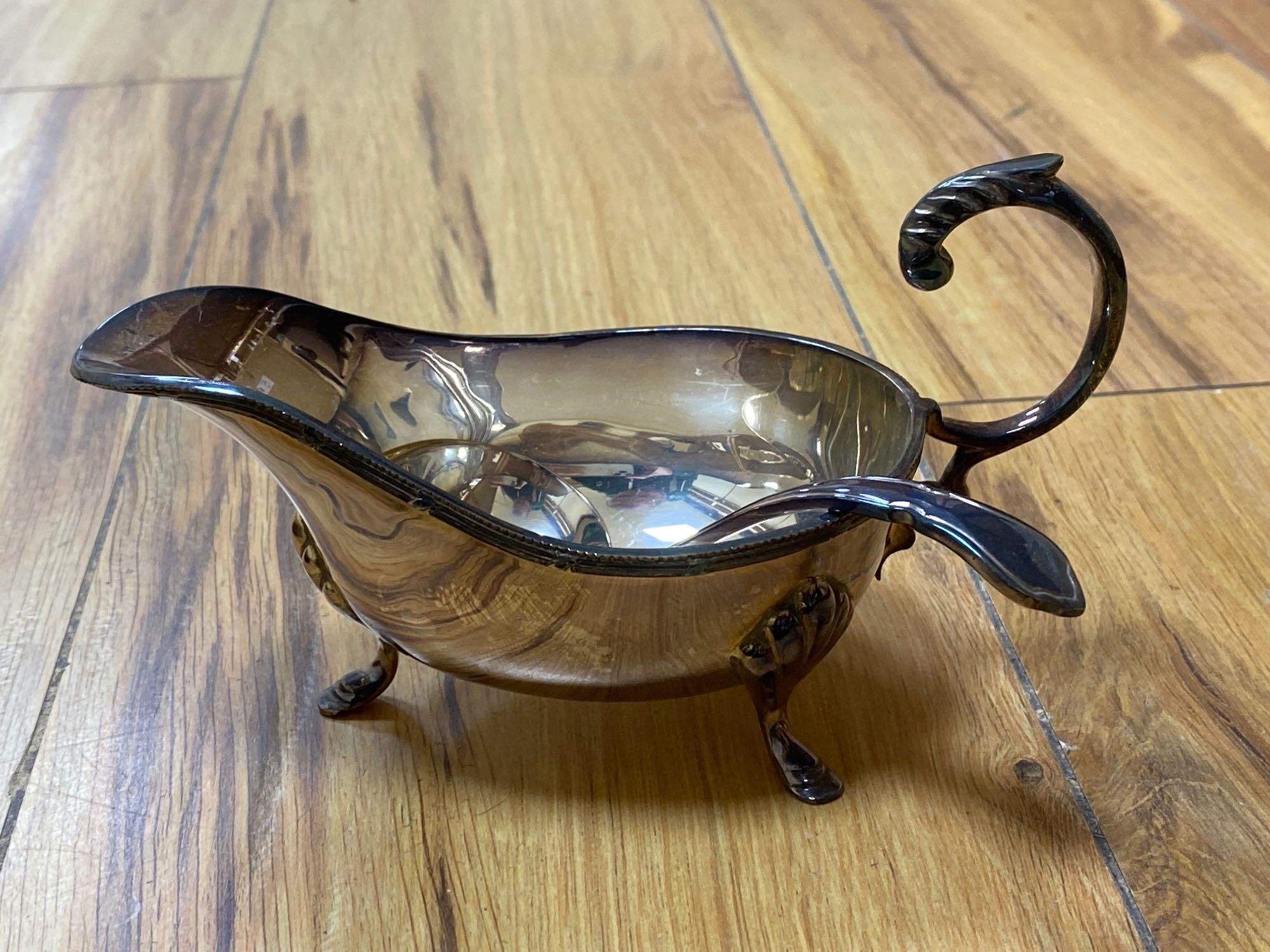 A large Walker & Hall oval plated two handled tea tray, a coaster, a crumb tray and sundry plated wares